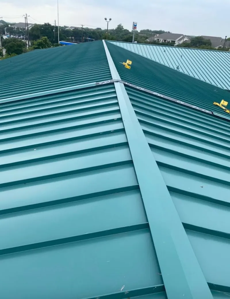Green commercial metal roof ridge and valley for Metal Roof Repair in Peculiar